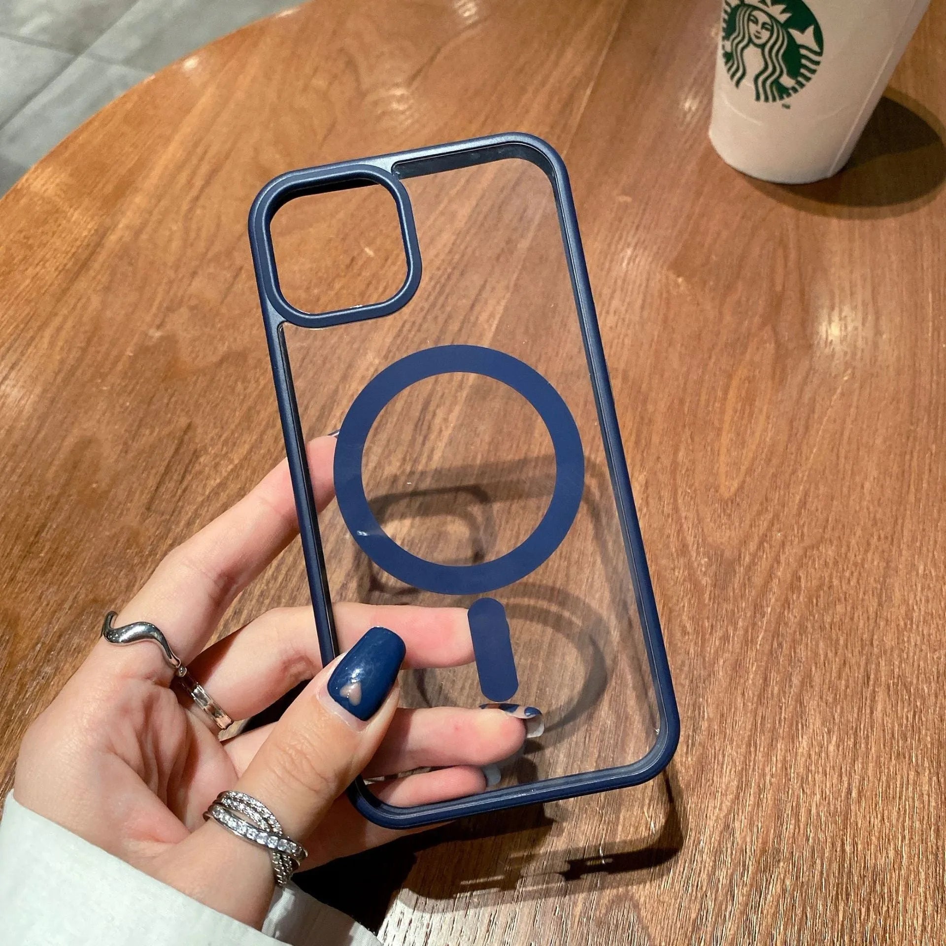 Transparent acrylic Magsafe phone case for iPhone with magnetic ring, shown in multiple colour options