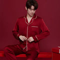 Red polyester sleepwear set for men and women with long sleeves and trousers