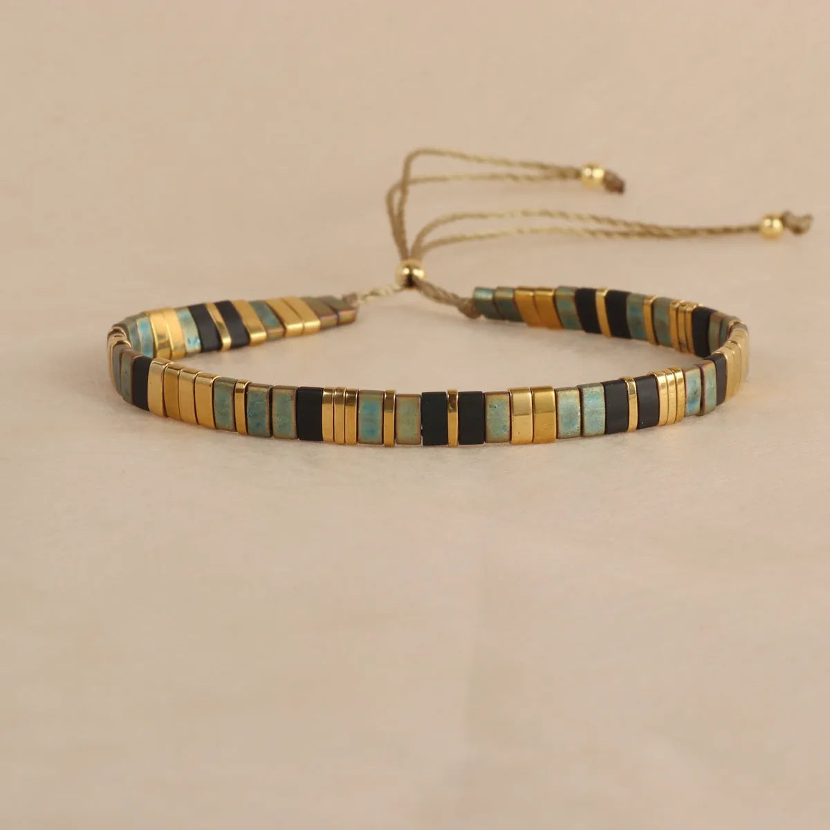 Geometric glass bead bracelet with pull adjustment in five colour options