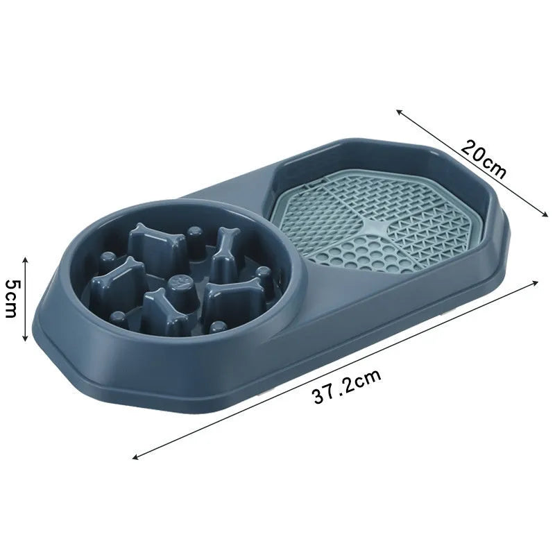 Blue slow feeder dog bowl with raised puzzle maze pattern and non-slip pads, shown from above.