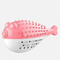Blue silicone fish-shaped chew and grab toy for cats on a white background.