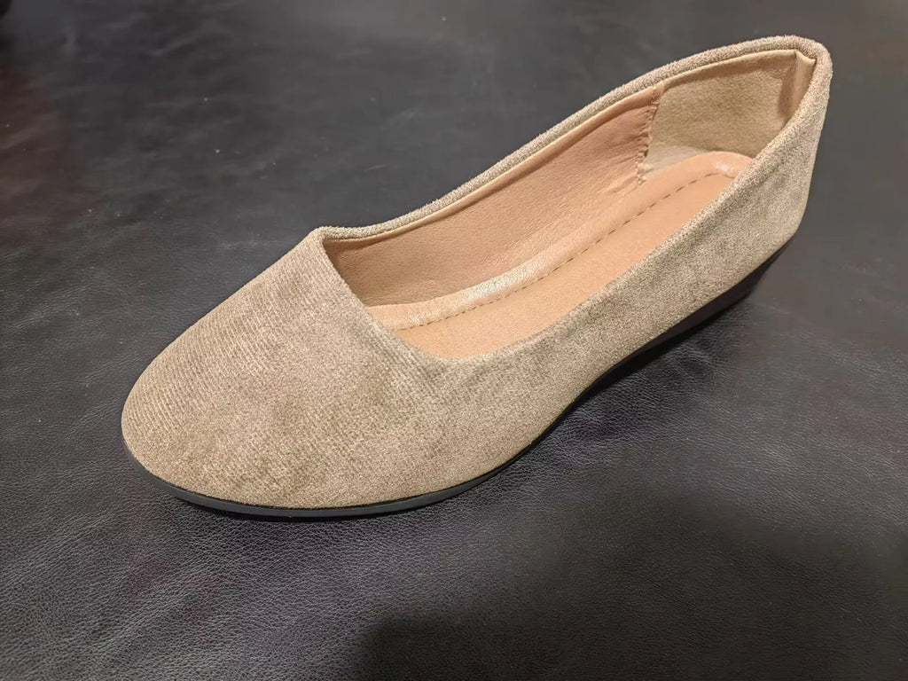 Women's black pointed toe wedge pumps with shallow mouth opening and low rubber wedge heel