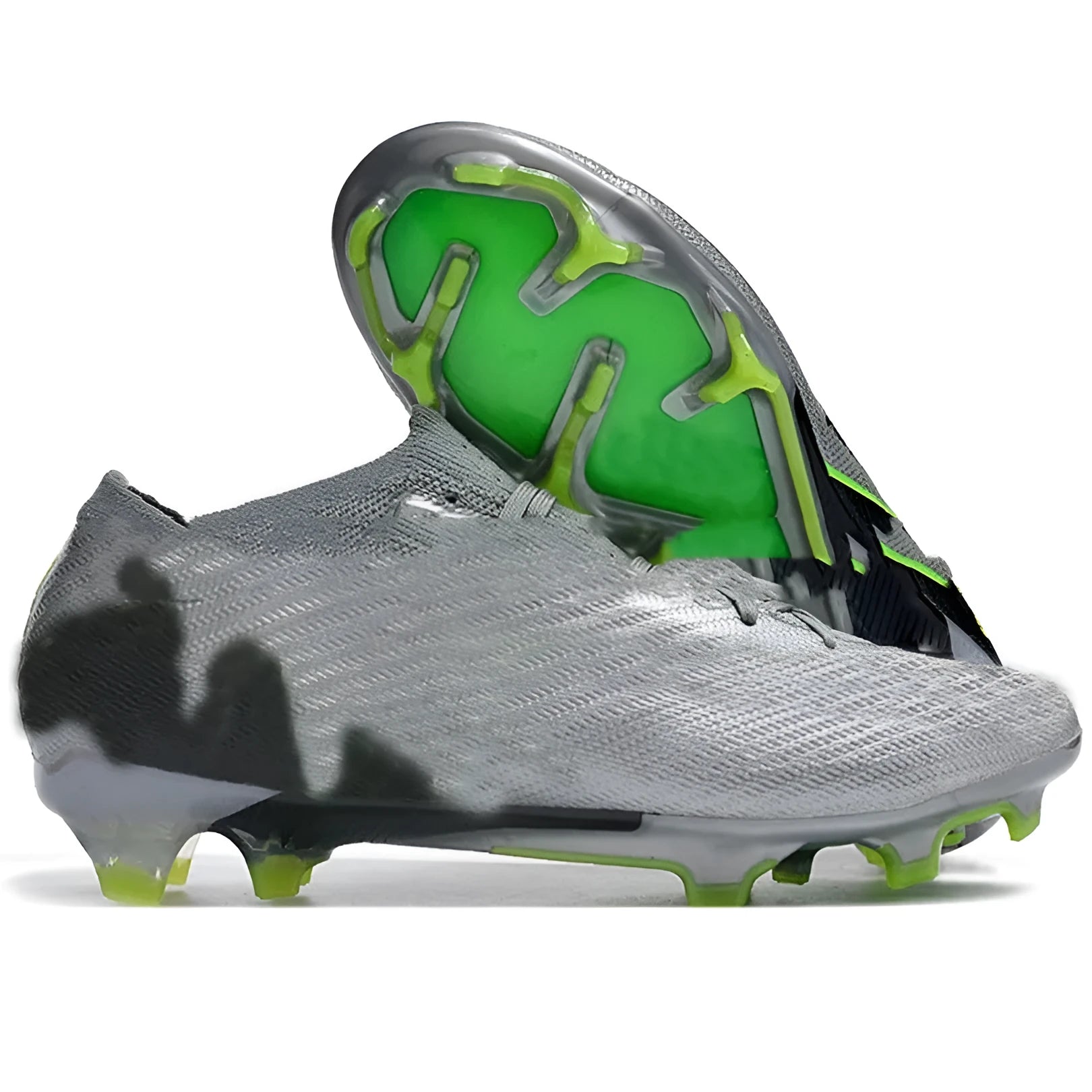 Men's football shoes with knitted upper, FG studs, and air cushion for firm ground surfaces