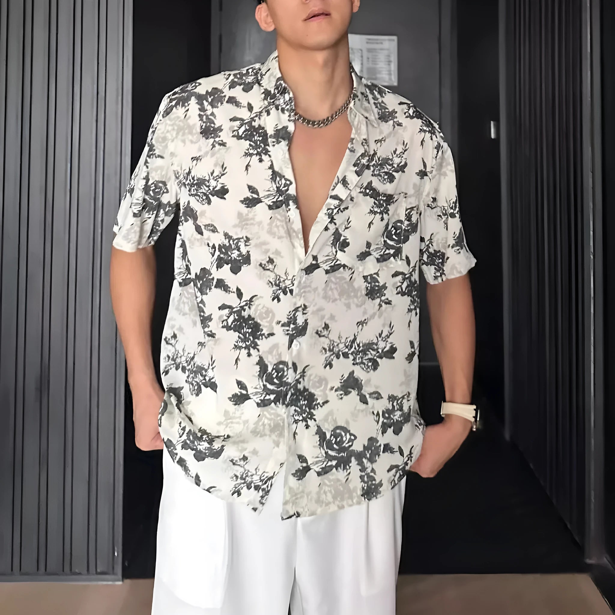 Black and white floral printed short sleeve shirt with loose fit cardigan style