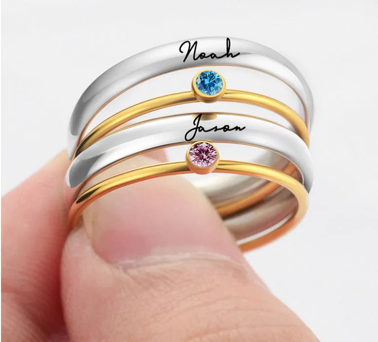 December birthstone engraved titanium steel ring with geometric superimposed design.