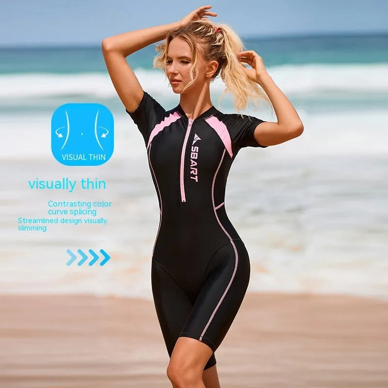 Women's solid colour one-piece swimsuit with short sleeves and built-in chest pad for surfing and swimming