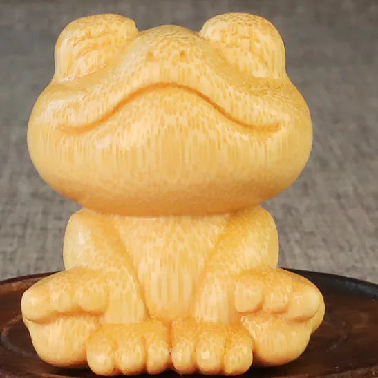 Solid bamboo smiling frog carving ornament with cartoon cute style measuring 5cm tall
