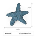 Blue rubber shark dog chew toy on a white background