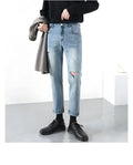 Men's light blue ripped jeans with microelastic cotton blend fabric, shown flat for size reference