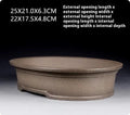 Handmade antique oval purple sand clay bonsai pot showing shallow 6.3cm height profile.
