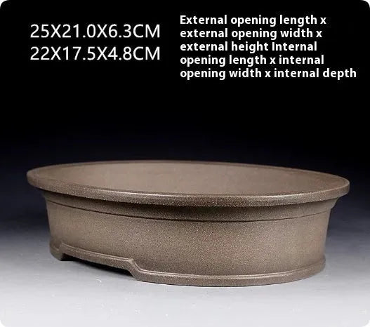 Handmade antique oval purple sand clay bonsai pot showing shallow 6.3cm height profile.