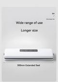 White compact automatic vacuum sealer machine for household food preservation on kitchen counter