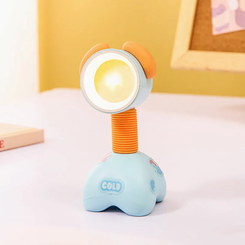 DIY cartoon magnetic small night lamp in assorted animal styles and colours on a desktop.