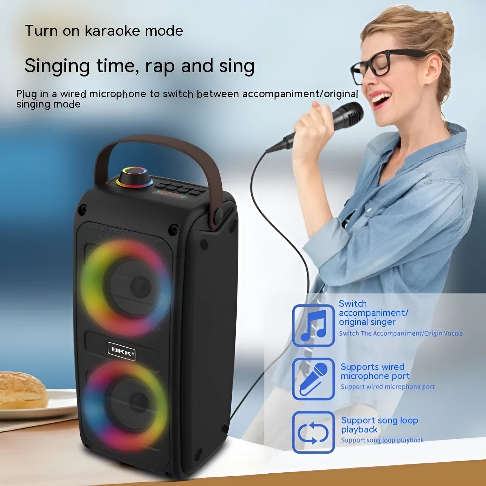 Portable Bluetooth speaker with colour light and radio in black plastic casing with button controls