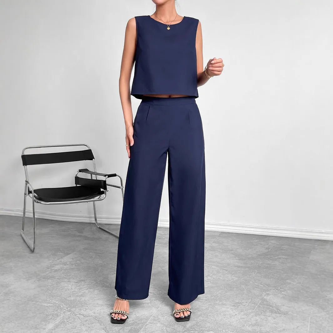 Women's red polyester two-piece set with sleeveless top and wide leg trousers