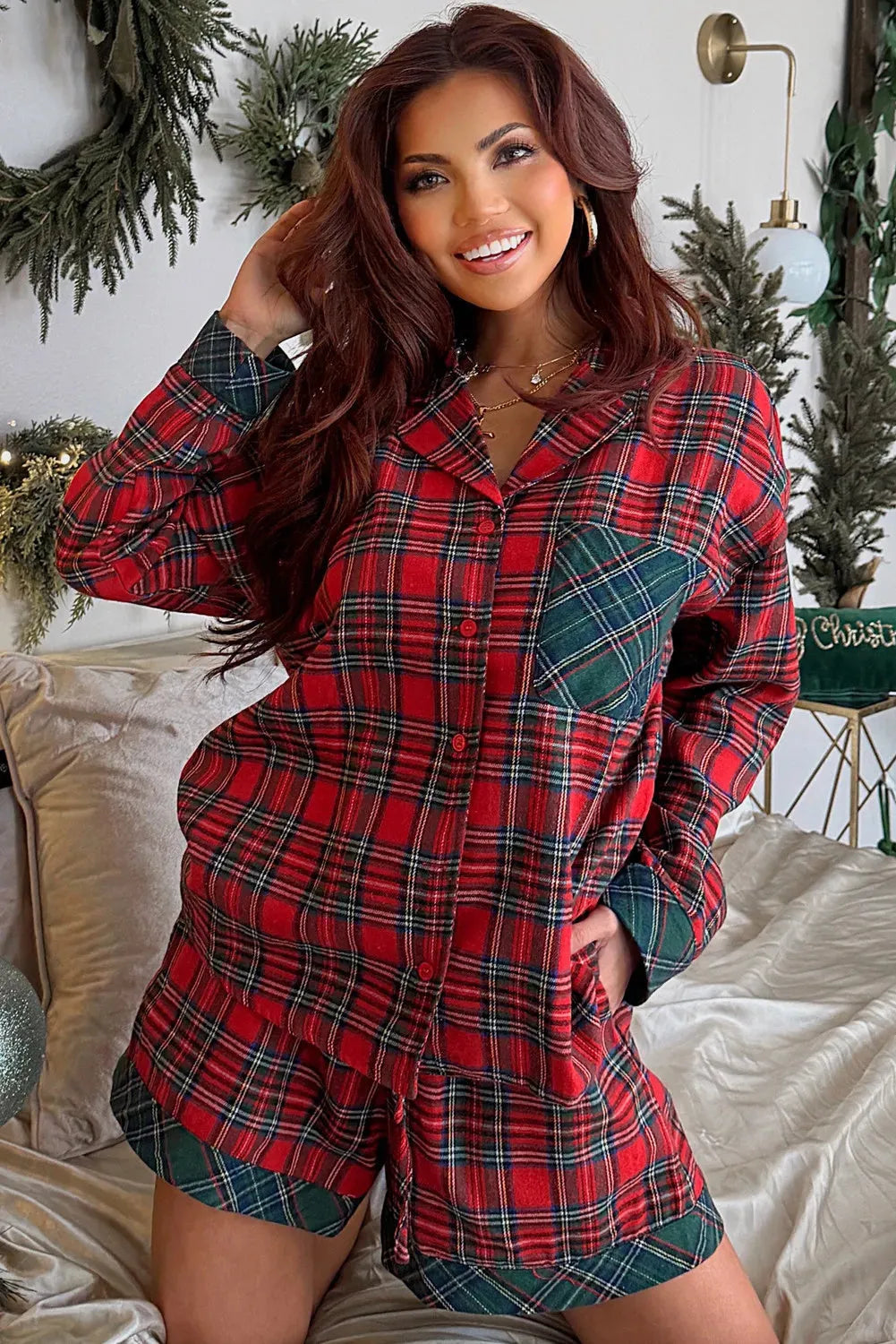 Red plaid Christmas pyjama set with long sleeve shirt and matching shorts in polyester-cotton blend fabric