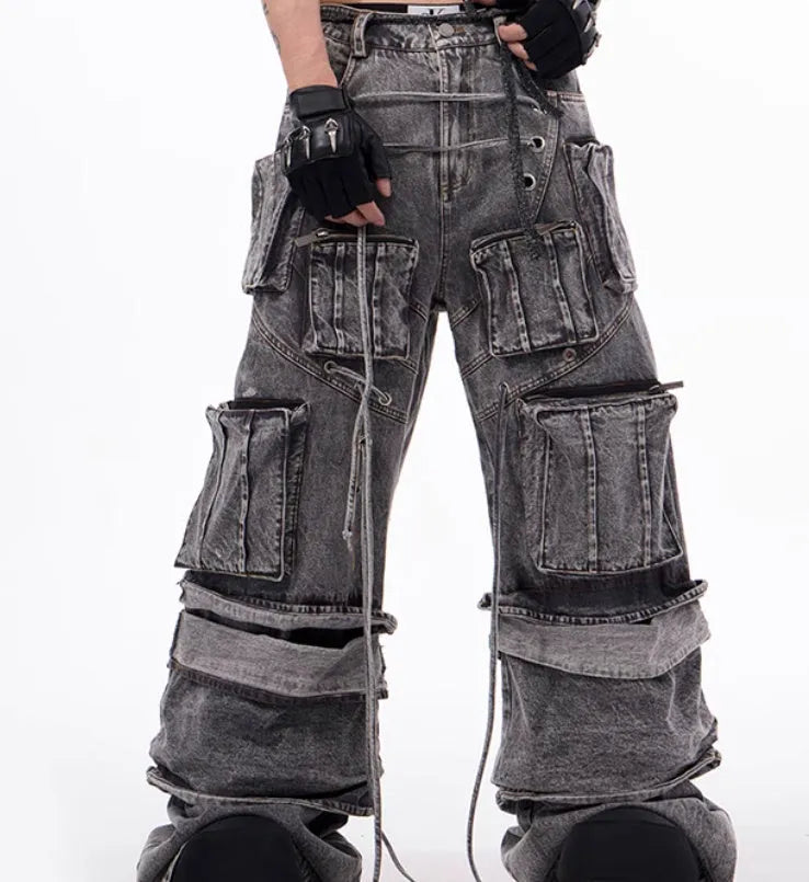 Grey distressed denim men's overalls with rope stitching and mop pant leg style