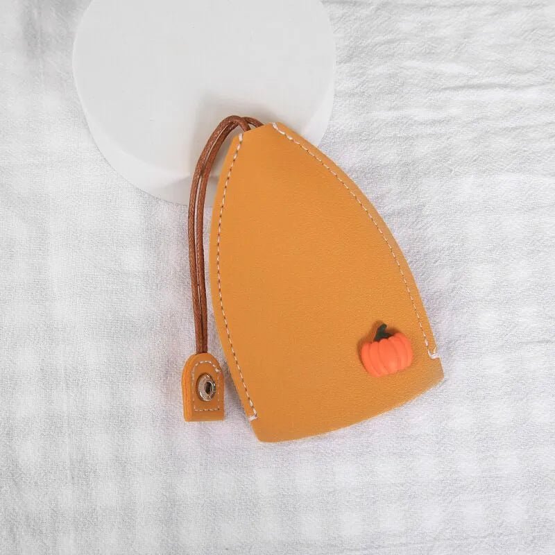 Cartoon design pull-out key case for car keys in PU leather.