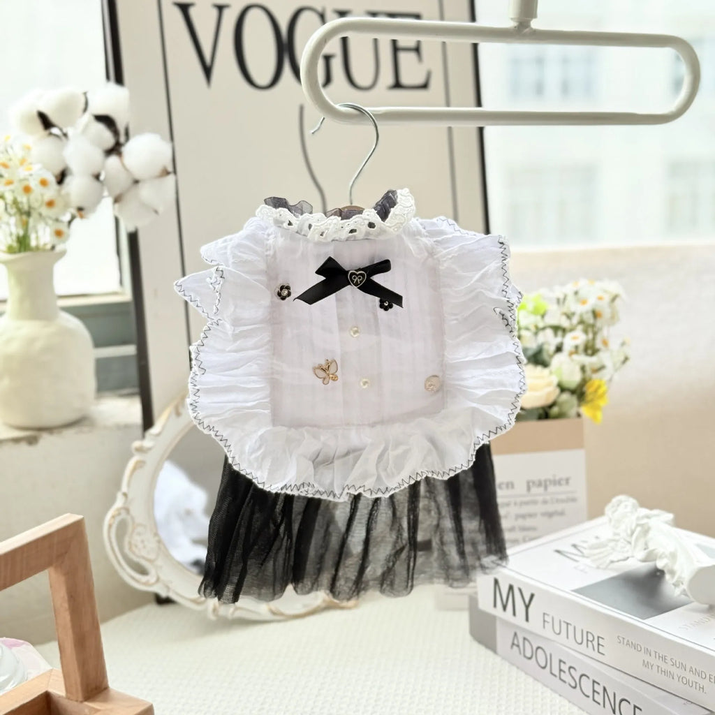 White yarn princess-style Waltz gauze skirt costume on a small dog, showing tiered design.