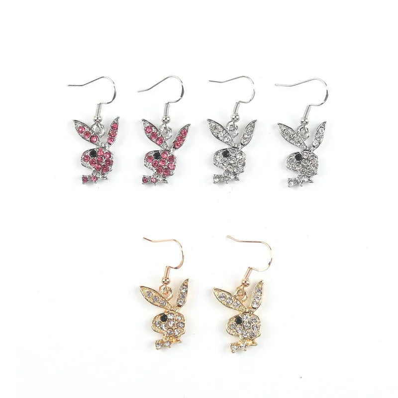 Close-up of cute full diamond rabbit stud earrings in alloy, showing gold, pink, and silver colour options.