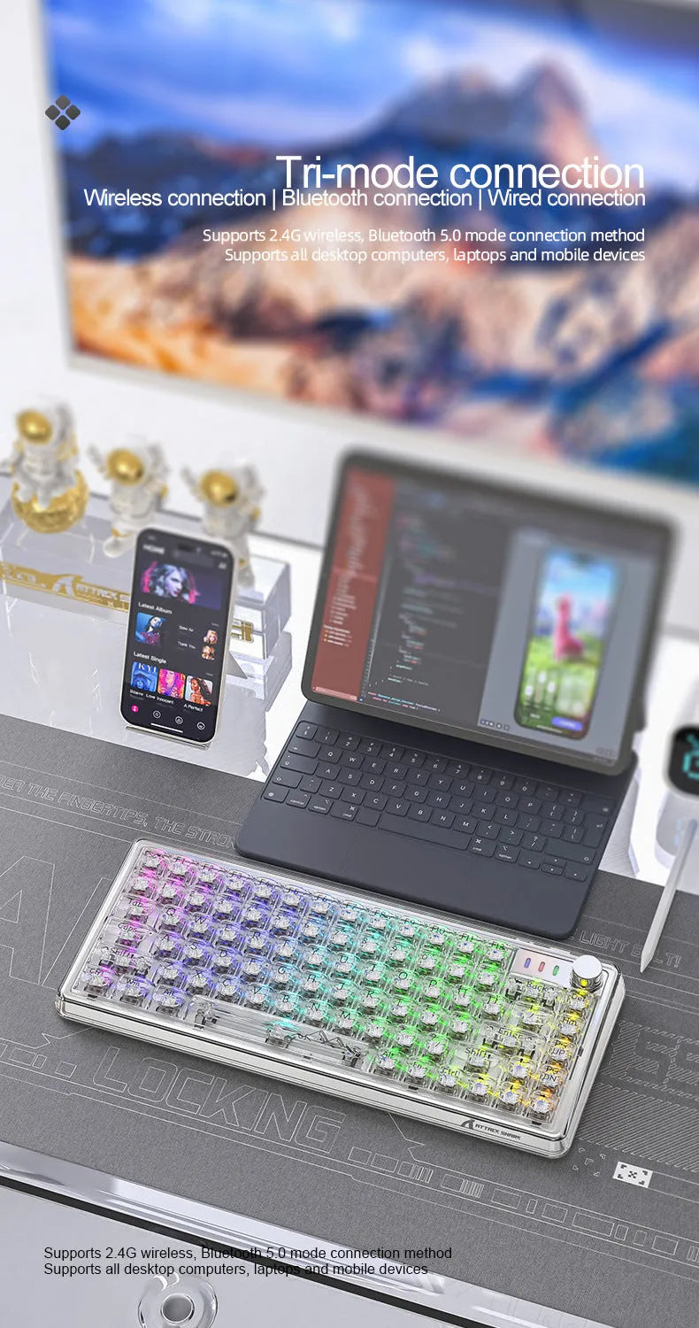 Attack Shark K75 white transparent wireless mechanical keyboard with RGB backlight on a desk.