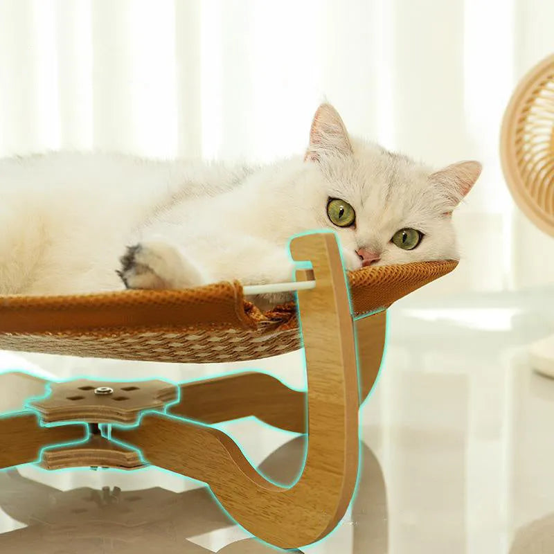 Brown woven rattan pet hammock bed for cats and small dogs on elevated stand