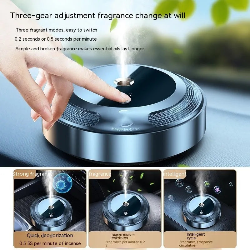 Compact zinc alloy car air freshener diffuser with automatic spray and three refill bottles.