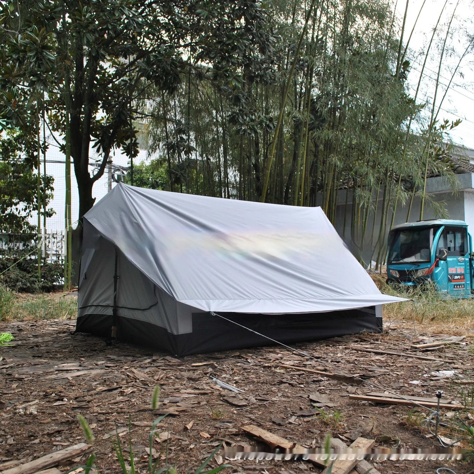Brown or white A-line hiking tent pitched with hiking poles showing 210x150x110cm dimensions