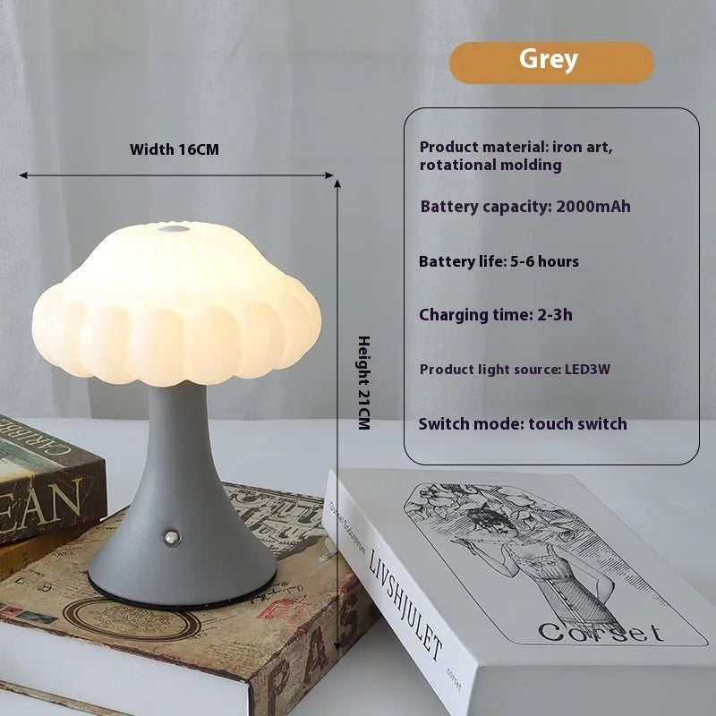 Wood grain finish mushroom-shaped touch night lamp on a table