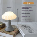 Wood grain finish mushroom-shaped touch night lamp on a table