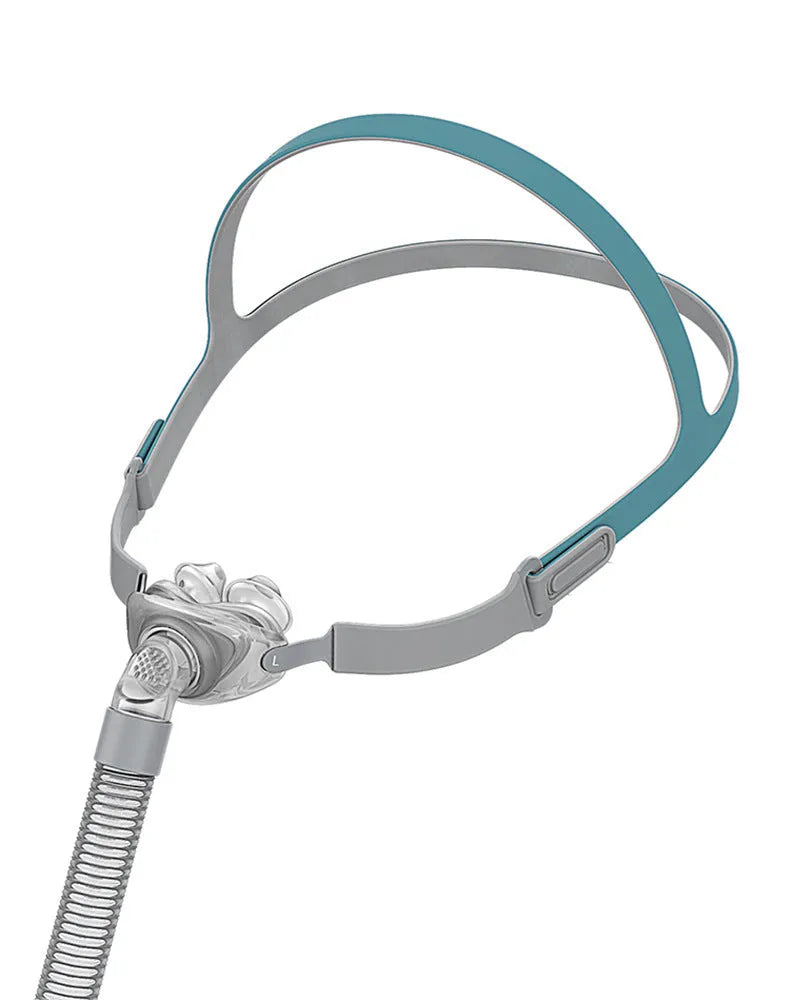 Ventilator nasal pillow mask with silicone cushion and adjustable headband components