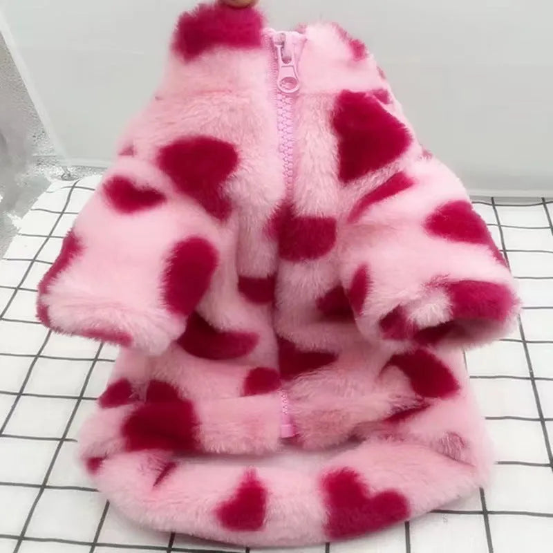 Small dog wearing a pink or brown plush warm coat in British style for Teddy and Bichon breeds