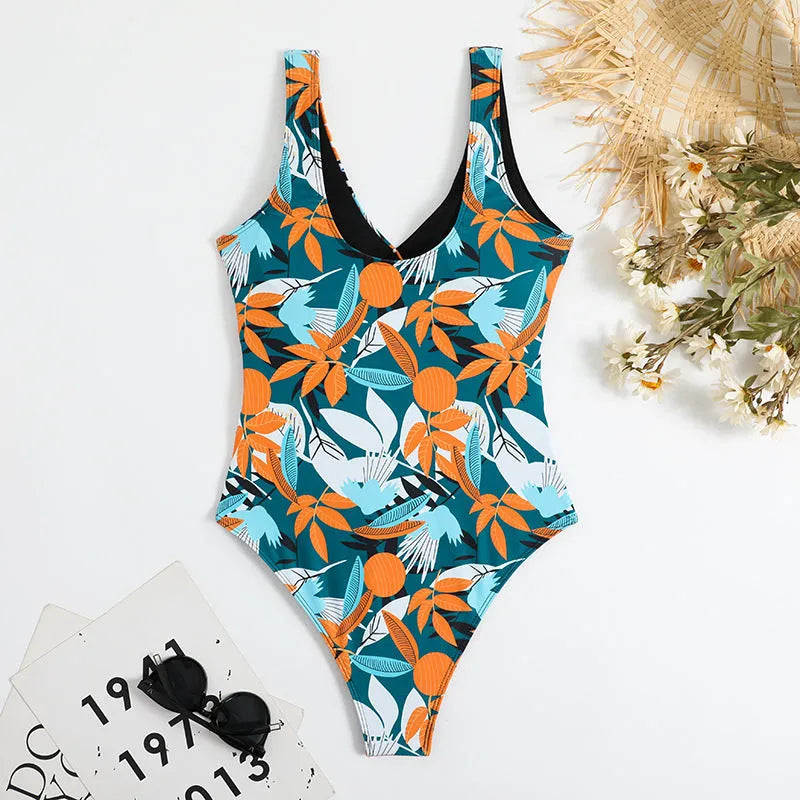 Women's high waist one-piece swimsuit in printed black or white pattern with conservative styling