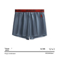 Solid colour men's boxer briefs in knitted polyester fabric showing mid waist design