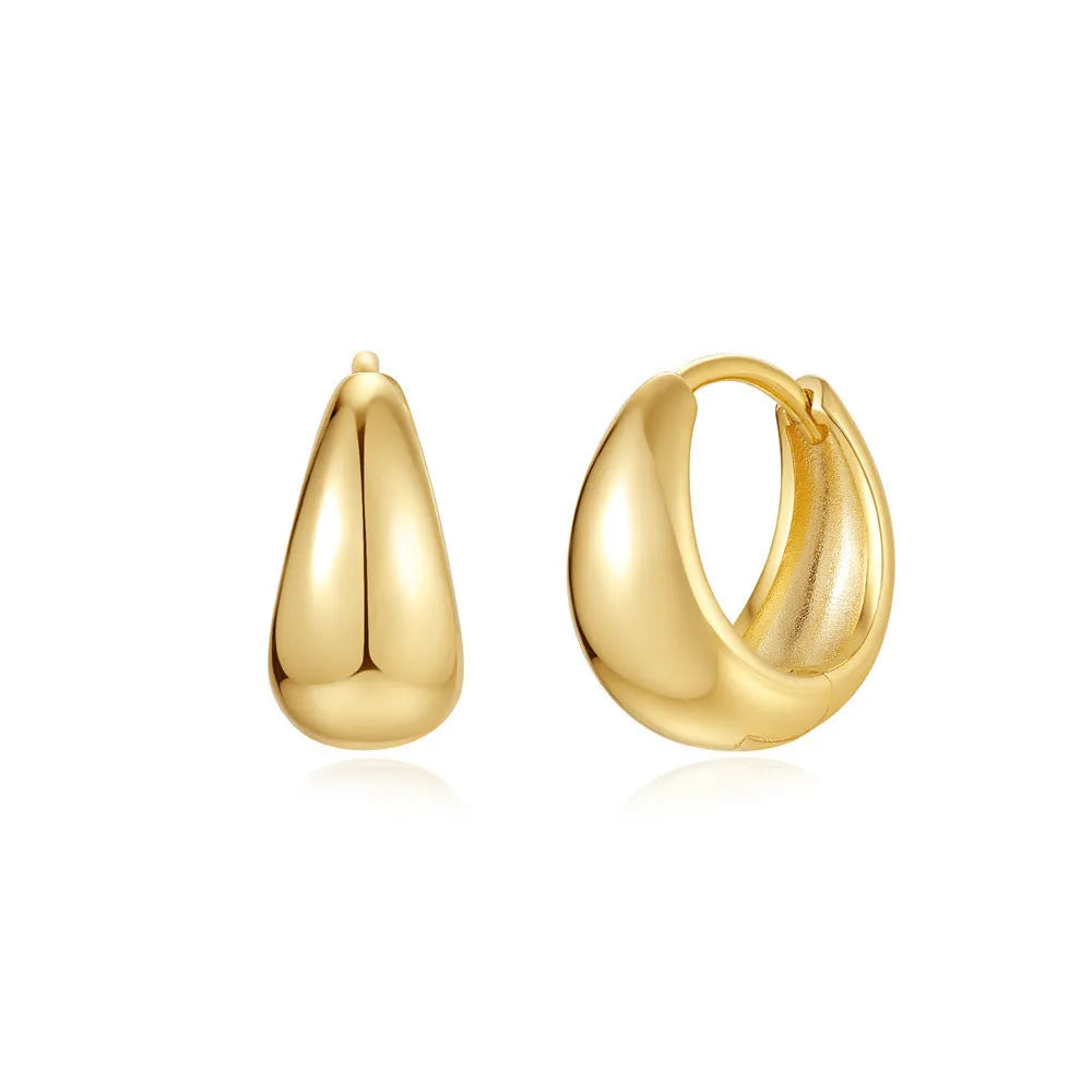 Brass geometric earclip earrings with electroplated gold finish and round design element