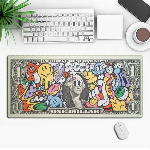 Large black gaming mouse pad with an anime character print, lying flat on a wooden desk.