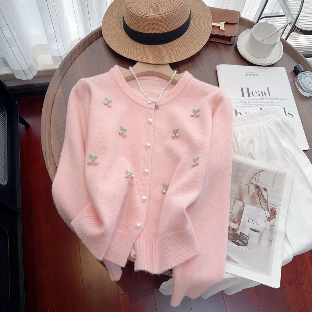 Women's slim fit cashmere blend cardigan coat in pink, shown open as a layer.