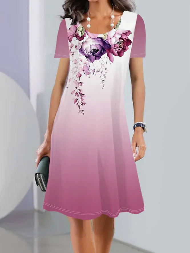 Light blue floral print A-line summer dress with short sleeves and round neck.