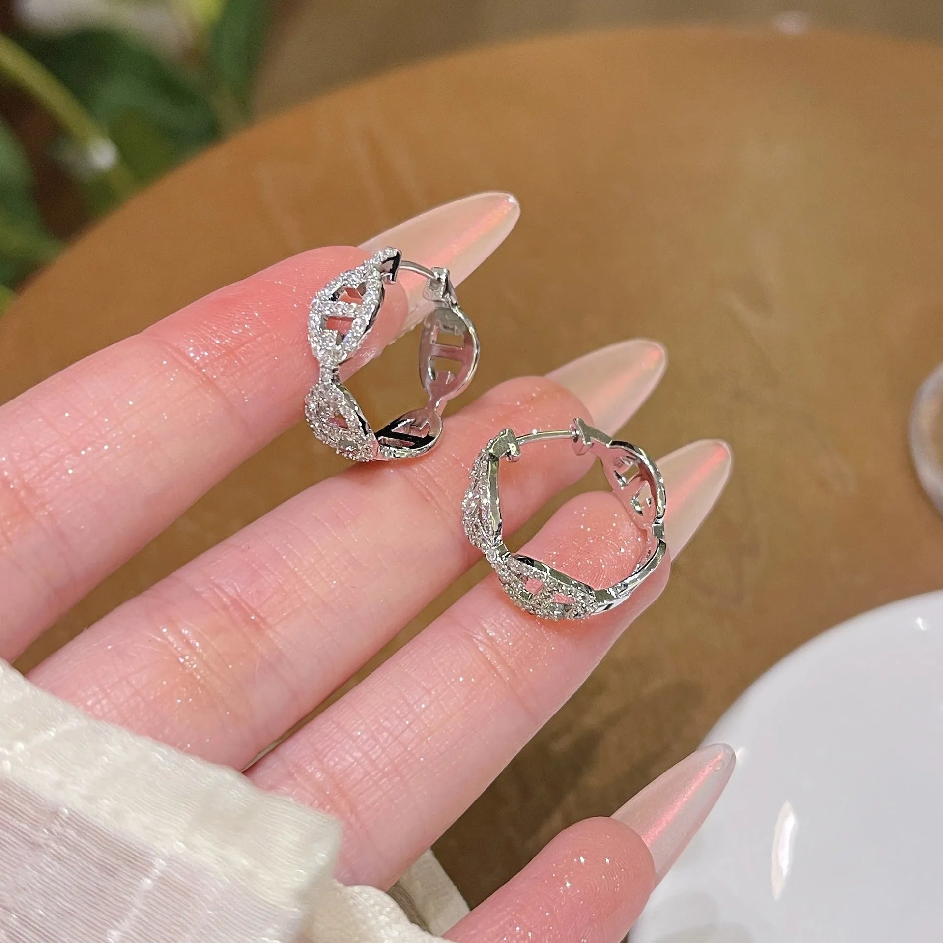 A pair of casual ladies earrings with a thick gold-plated finish in silver, gold, or rose gold colour.