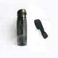 Black water bottle shape hidden safe with secret compartment on a white background