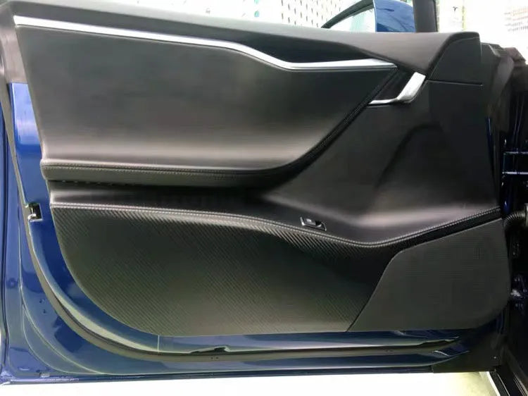 Carbon fibre protective film for Tesla Model S car door interior panels, four-piece pack.