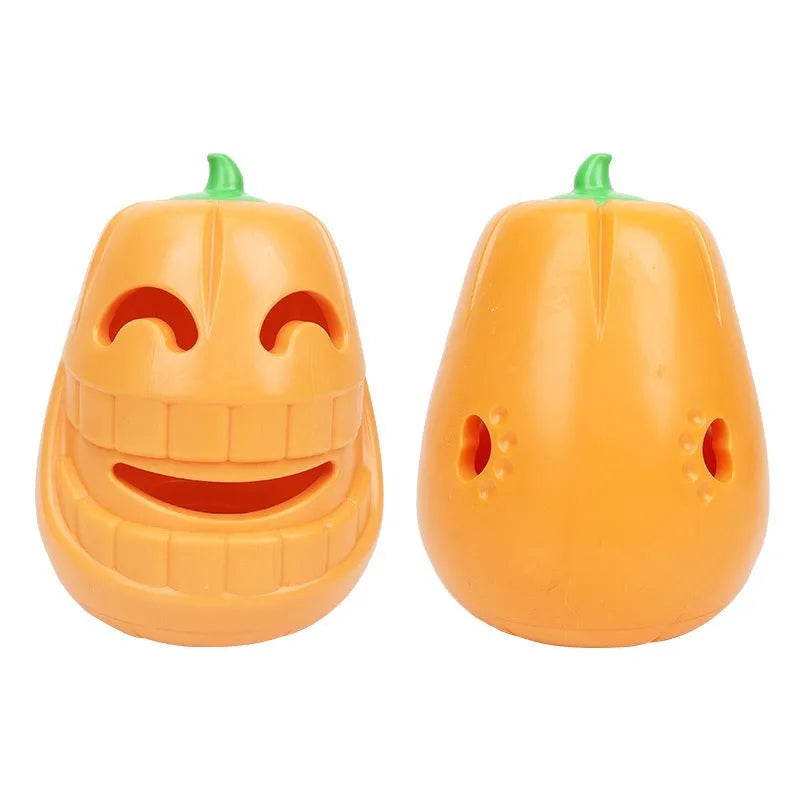 Halloween pumpkin shaped orange dog chew toy with treat-dispensing funnel opening