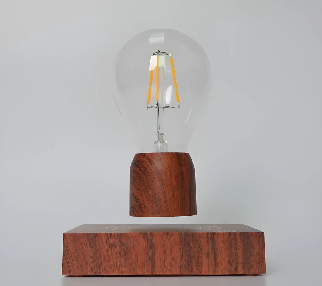 Magnetic levitation floating light bulb hovering above imitation wood base