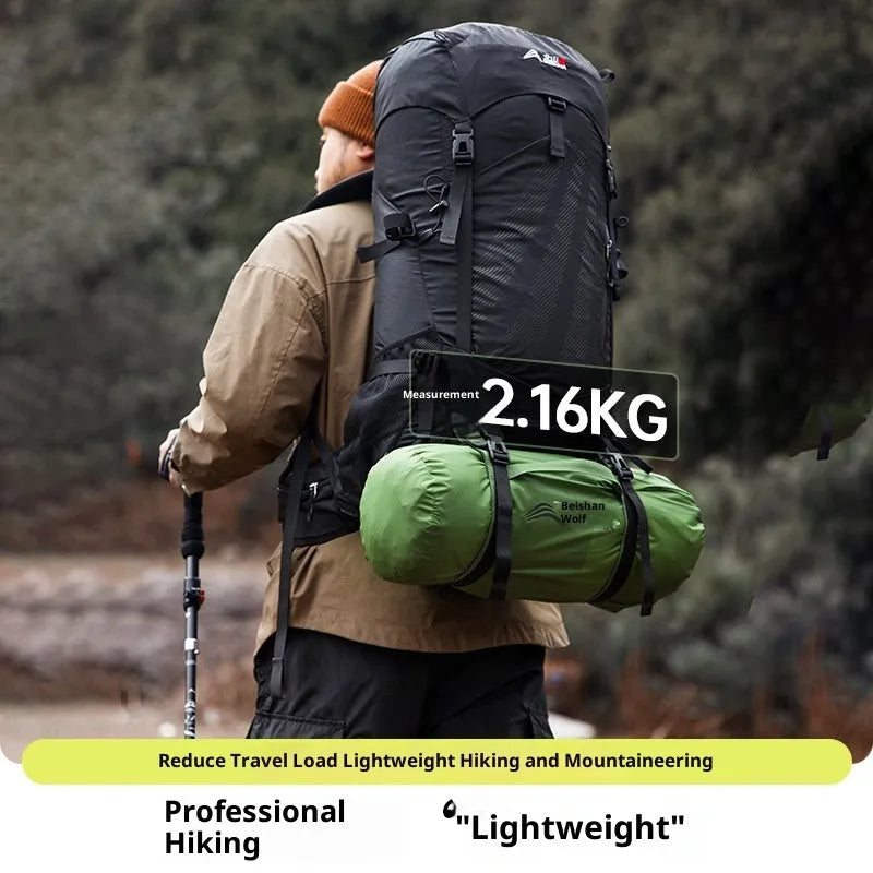 Portable 1-2 person outdoor hiking tent with aluminium rods in Harano Green, set up outdoors