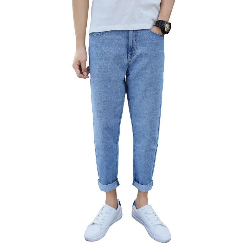 Men's black loose straight fit harem jeans with lightweight straight leg opening