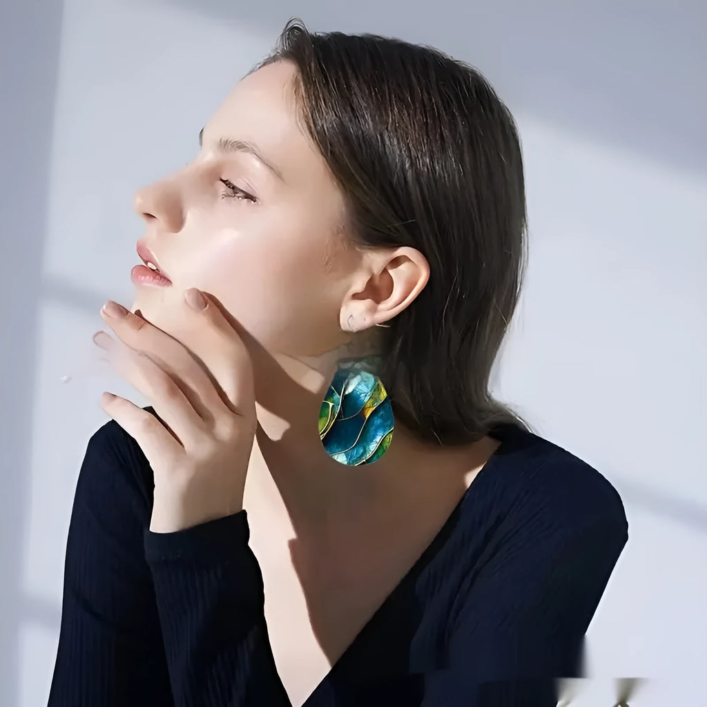 Acrylic flat branch knot drop earrings with printed details and contemporary design
