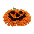 Orange pumpkin-shaped dog sniffing mat with furry fabric texture for slow feeding