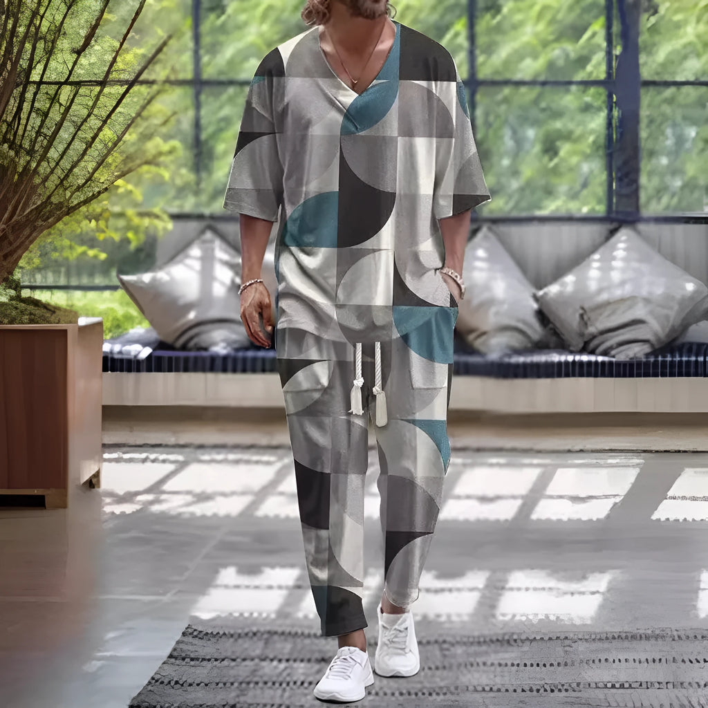 Women's grey V-neck cropped sleeve tracksuit set with matching trousers on a hanger