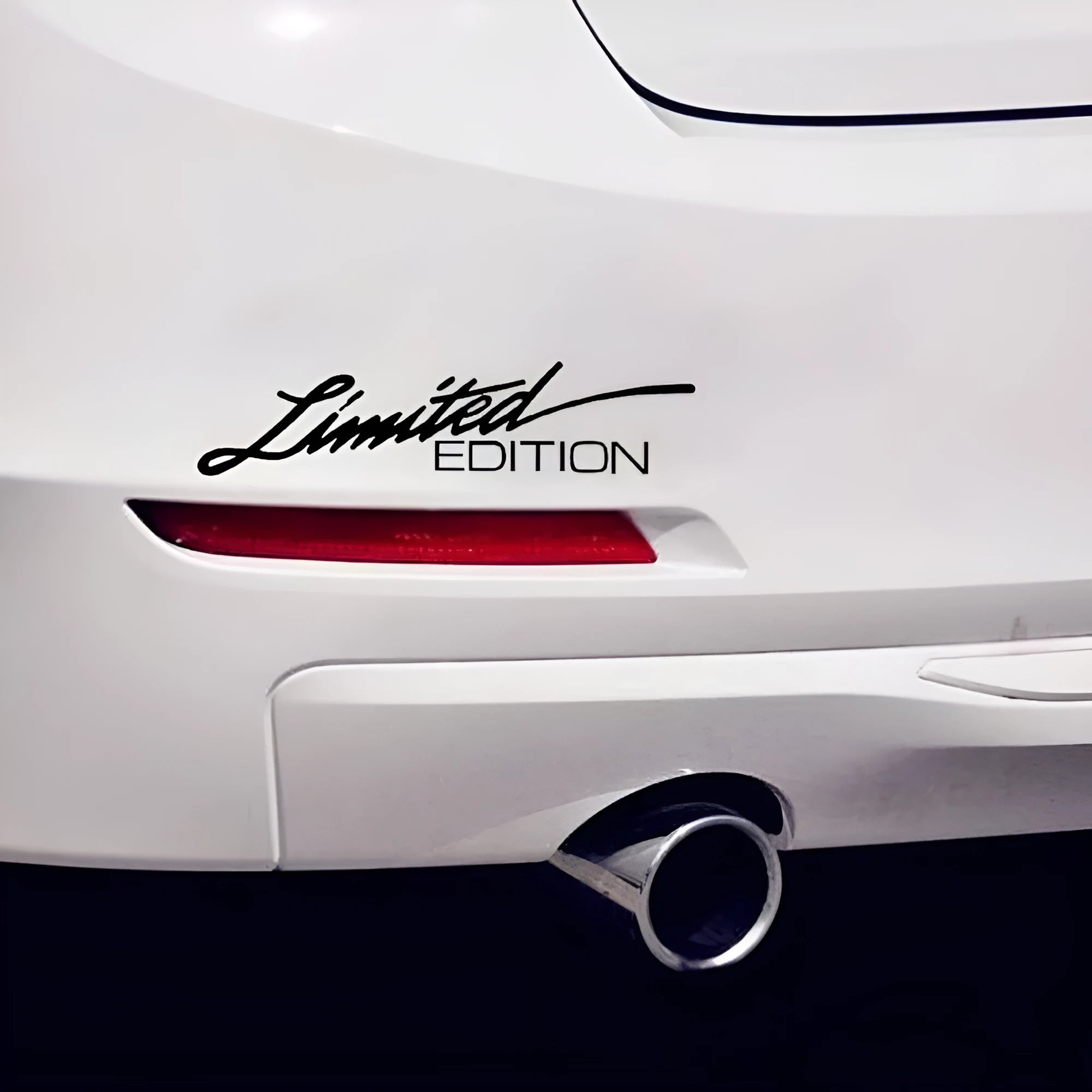 Reflective British bumper sticker showing 16cm by 3.8cm size in black, white, and colourful options