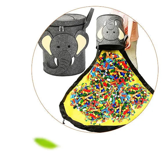 Green felt cube storage bag with pull rope closure opened as play mat